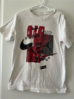Kids Nike White Graphic Tee with Red & Black Design Small